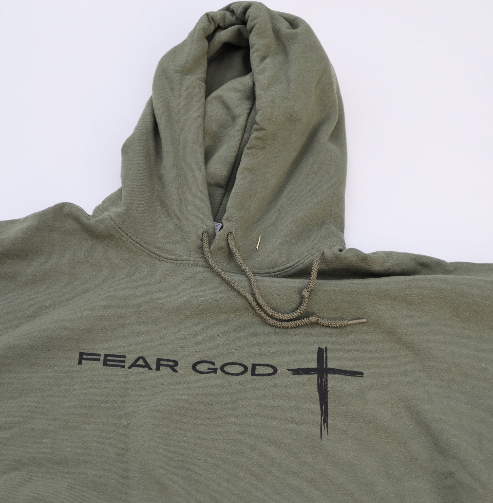 Front view of the Fear God Christian hoodie in military green.